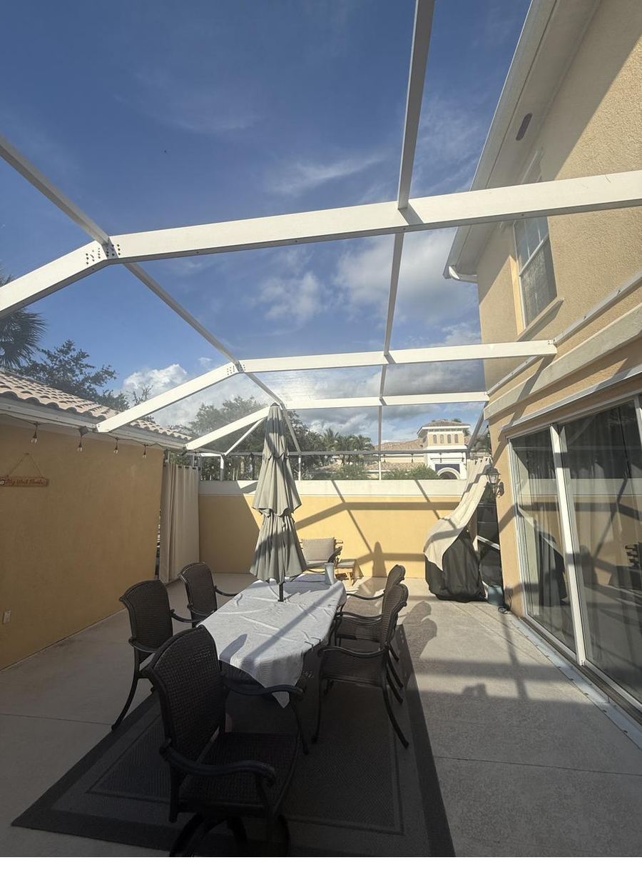 Screened lanai and pool cage after a spider treatment
